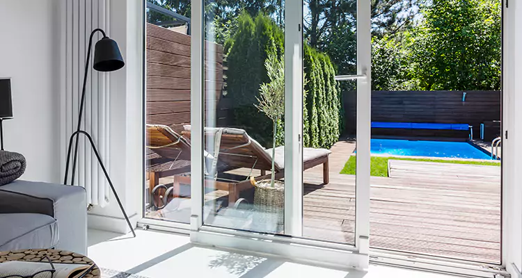 Fixing A Sliding Screen Door Roller in Four Corners, FL